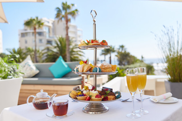 Women’s Day High Tea President Hotel President Hotel Bantry Bay Cape Town Atlantic Ocean View High Tea Luxurious High Tea Cape Town Women’s Day Celebration Cape Town High Tea Menu President Hotel Live Entertainment High Tea Event Cozy High Tea President Hotel
